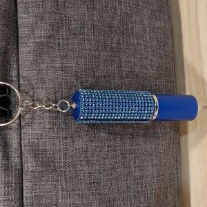 NWOT PERFUME BOTTLE KEYCHAIN